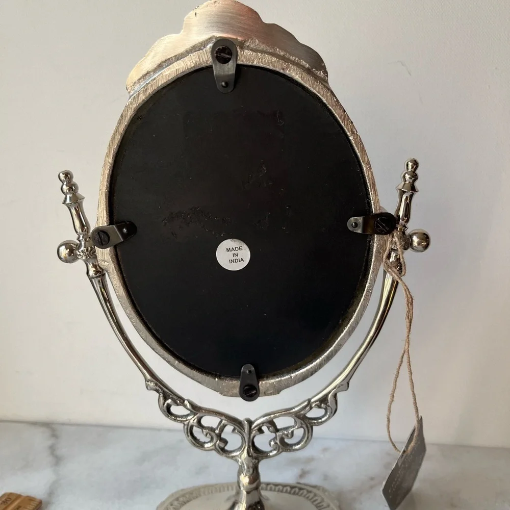 Silver tone metal antique style vanity mirror adjustable free standing 10” high